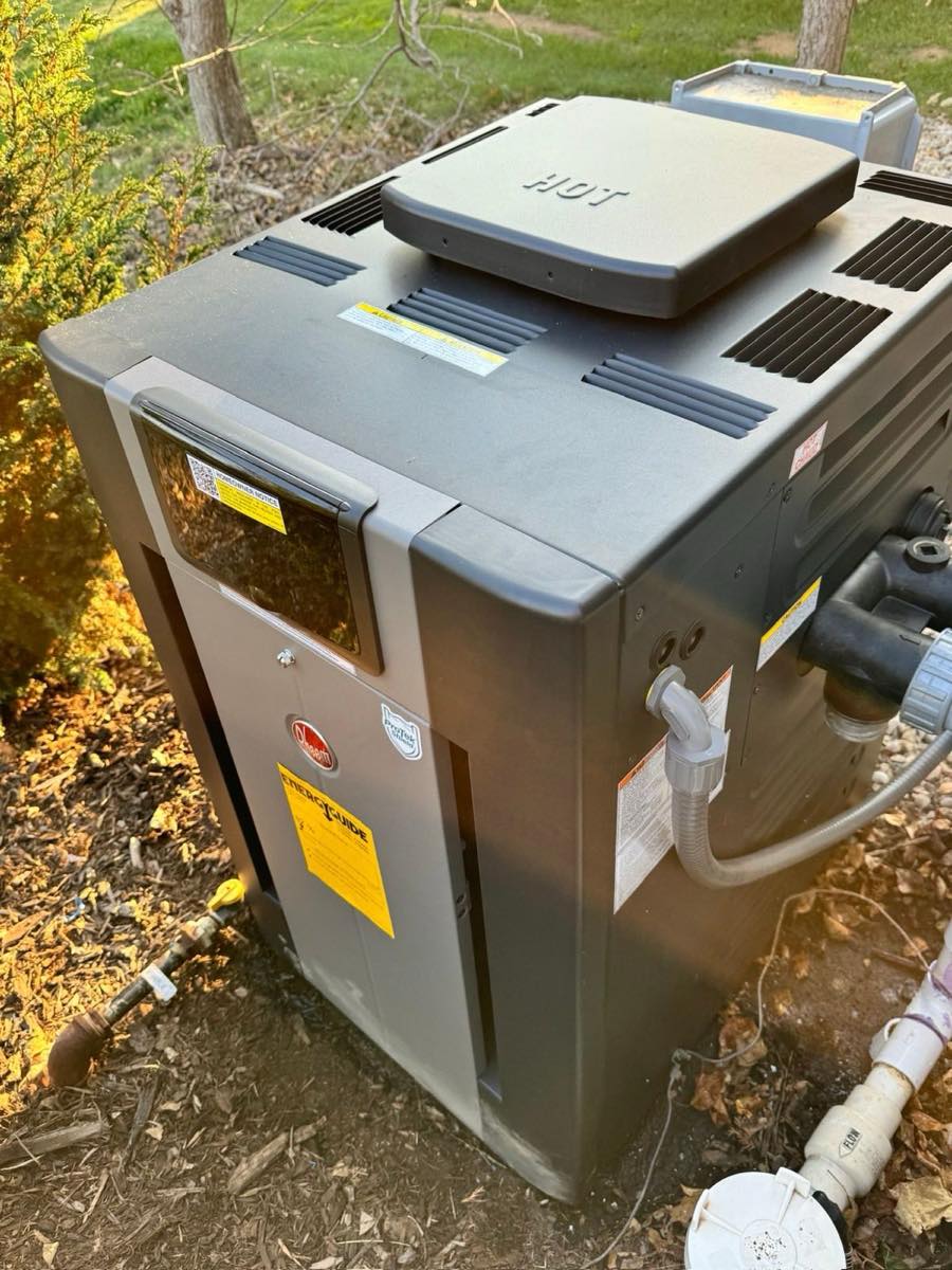 New Rheem natural gas pool heater installed by Heartland Pool and Spa in Hartland WI