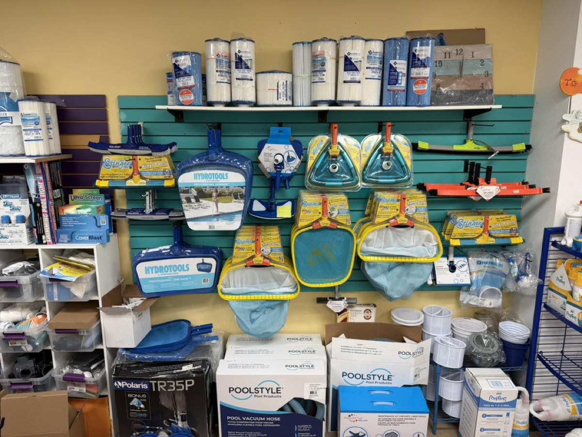 Skimmers, leaf rakes, vacuum hoses, and filter cartridges stocked at Heartland Pool and Spa in Hartland WI